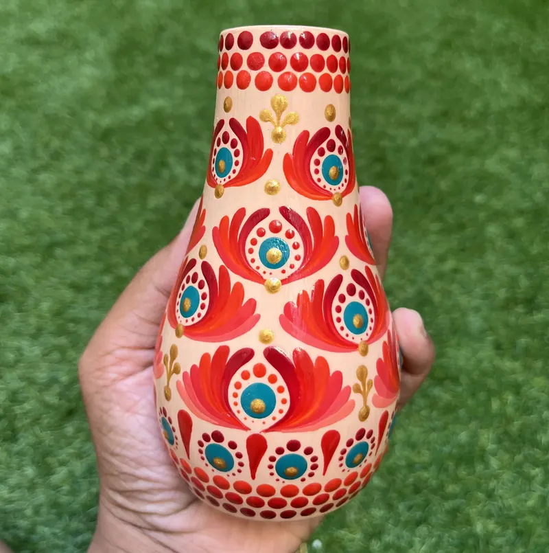 Small cream vase hand-painted with red and turquoise dot motifs