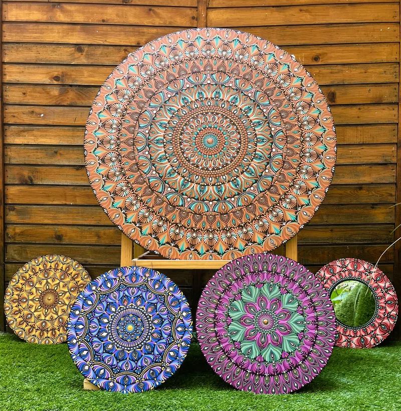 Hand-painted dot mandala art by Chaya Jathan